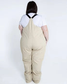 Beige plus-size snow bib overalls from Snow Country Outerwear Women’s Vertex collection