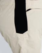 Beige pants with black accent from Snow Country Outerwear Women’s Plus Size Ski Bibs