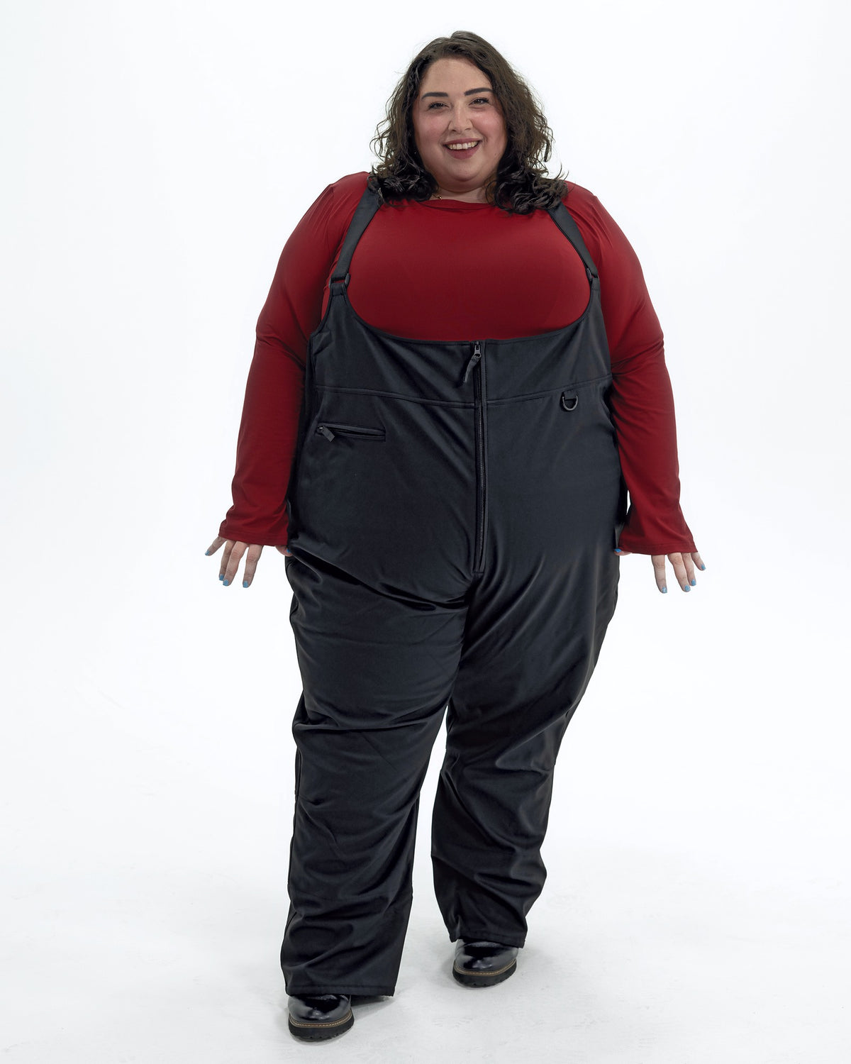Black women's plus size soft shell snow bibs, front | Model is 5'4" and wears a 5X