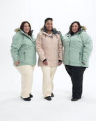 The Sugar Coat II plus size insulated snow jacket, sizes 1X to 6X, worn by three models in Green Lily and Pink Blush