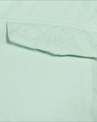 Mint Sugarcoat plus size insulated snow jacket, chest pocket and criss cross stitching detail