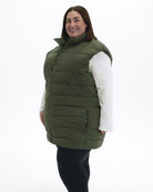 Scout Green Tempo II women's plus size insulated vest, three quarter view | Model is 5'4" and wears a 3X