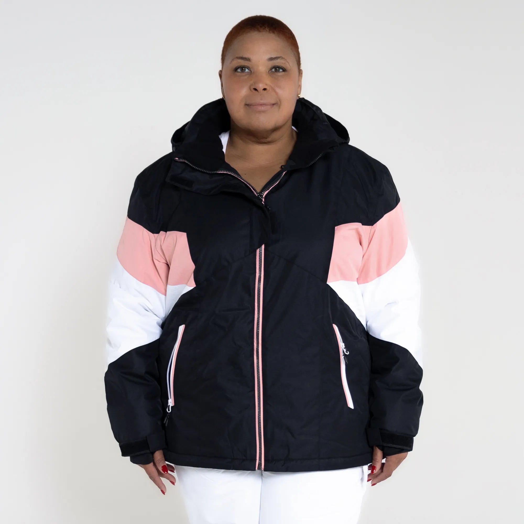 plus size woman wearing plus size winter jacket in pink