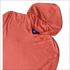Coral-colored hooded shirt from Snow Country Outerwear Plus Size Athleisure collection