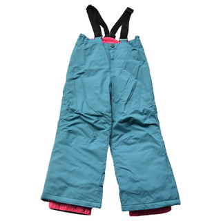 Blue snow pants with black suspenders and pink lining from Snow Country Outerwear for girls